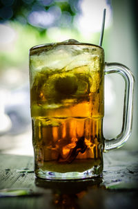 Close-up of beer in glass on table