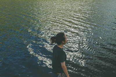High angle view of someone standing near the river. 
