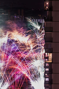 Firework display at night