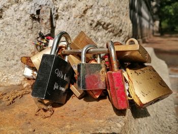 Close-up of love padlocks hanging on metal