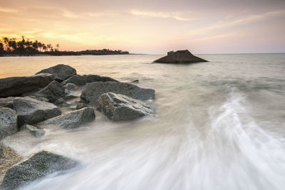 Scenic view of sea against sky during sunset