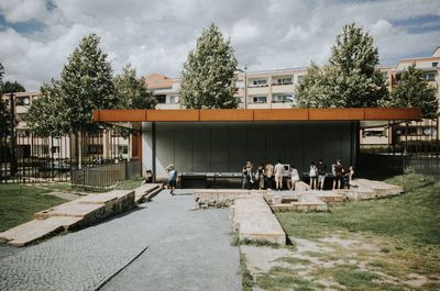 Group of people in front of building