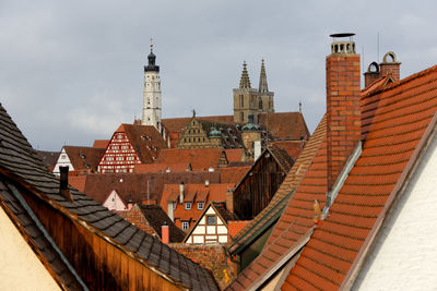 Buildings in city against sky