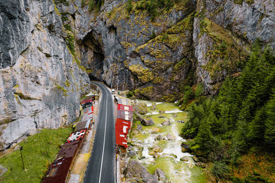 Aerial view of road and shops in mountain canyon