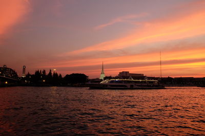 Scenic view of sea against sky at sunset