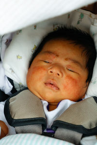 Close-up portrait of cute baby sleeping