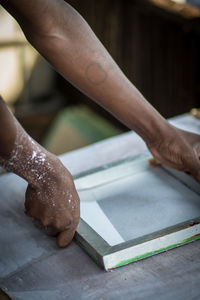 Close-up of hands working