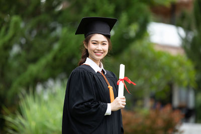 Portrait of young woman smiling