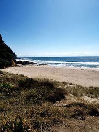 Scenic view of beach against sky