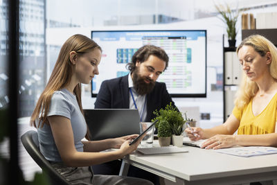 Business colleagues working in office