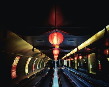 Illuminated tunnel at subway station