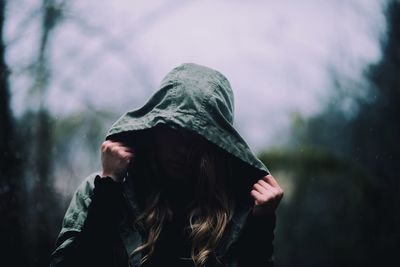 Close-up of a woman in rain