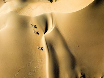 High angle view of sand dunes at beach