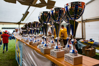 Close-up of trophies on table
