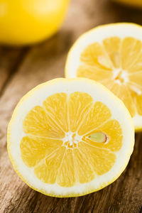 Close-up of lemon slice in plate