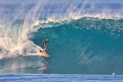 Man surfing in sea