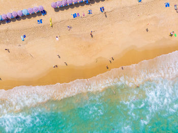 Aerial view of people enjoying at beach