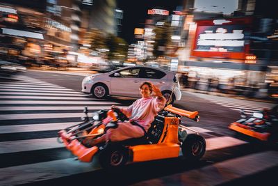 Blurred motion of car on city street