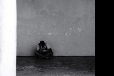 Man sitting on floor