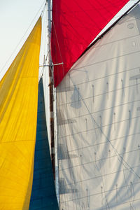 Low angle view of canvas on sailboat