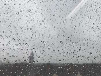 Full frame shot of water drops against sky