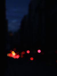 Illuminated red lights at night