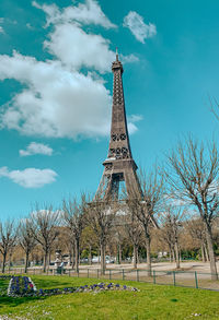 View of tower against cloudy sky