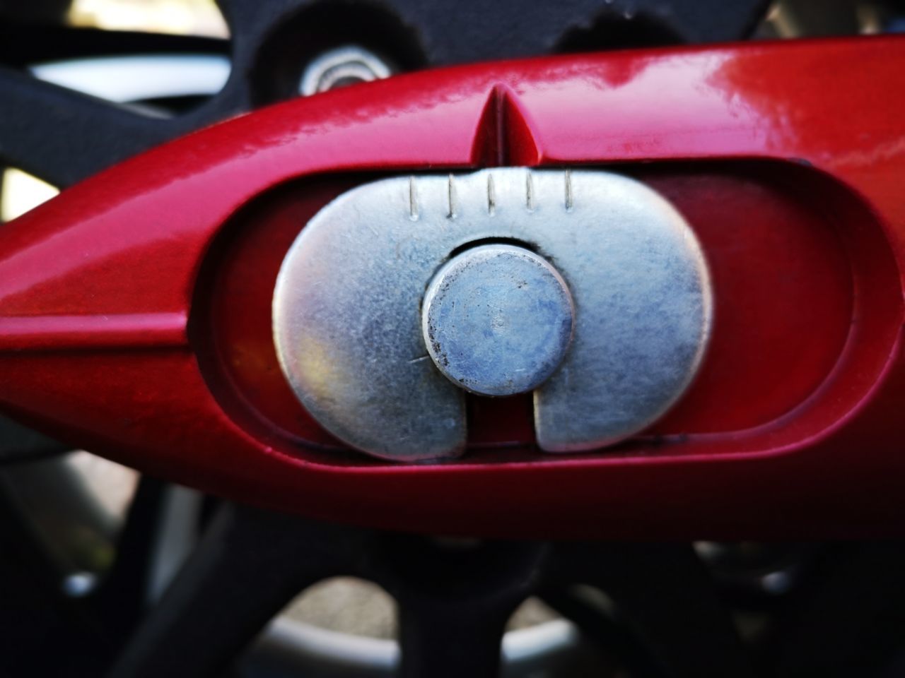 CLOSE-UP OF RED WHEEL