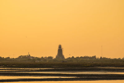 View of mosque against sky during sunset