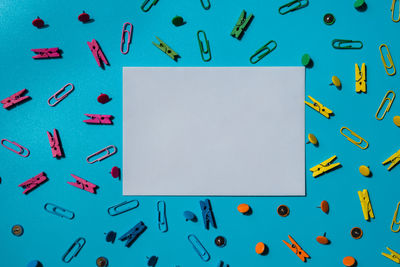 Directly above shot of objects against blue background
