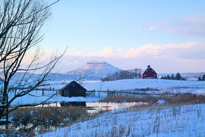 House on snow covered field