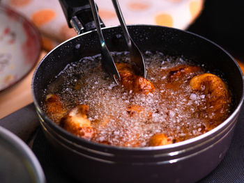 High angle view of meat in cooking pan