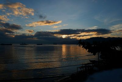 Scenic view of sea against sky at sunset