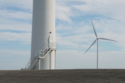 Wind turbine socket close-up and another one in the distance