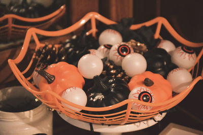 High angle view of eggs in basket on table