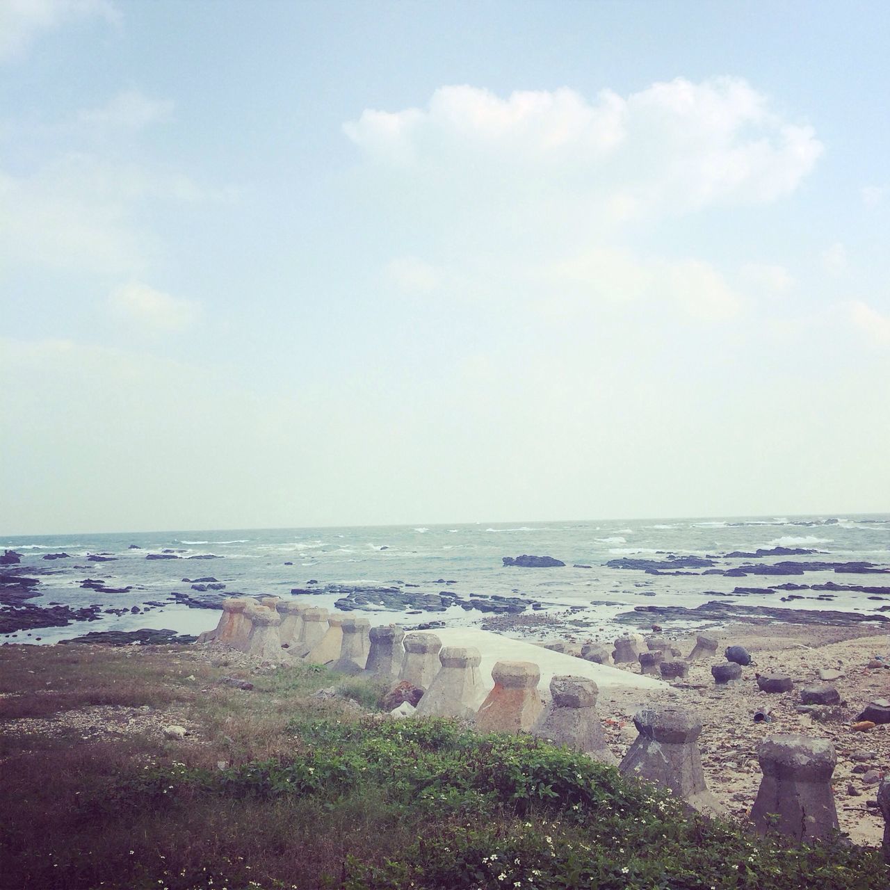 sea, horizon over water, water, beach, sky, scenics, tranquil scene, shore, tranquility, beauty in nature, nature, coastline, idyllic, cloud - sky, outdoors, day, no people, cloud, high angle view, sand