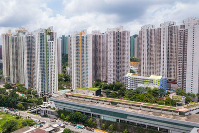 Modern buildings against sky in city