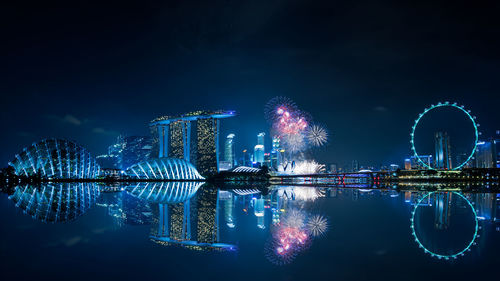 Low angle view of illuminated city at night