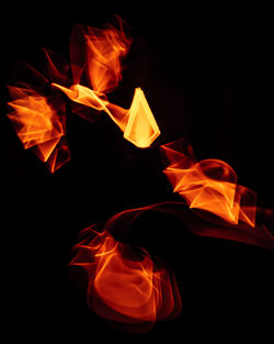 Close-up of fire against black background