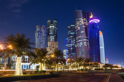 Illuminated city lit up at night