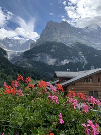 Scenic view of mountains against cloudy sky