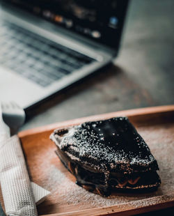 Close-up of laptop on table