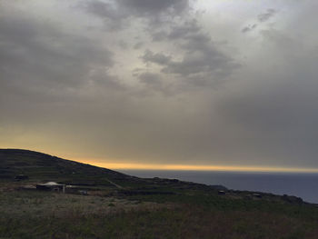 Scenic view of landscape against sky during sunset