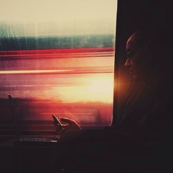 View of sunset through train window