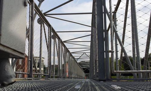 View of bridge against cloudy sky