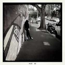 Woman walking on city street