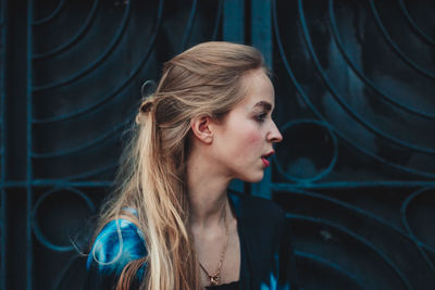 Portrait of young woman looking away