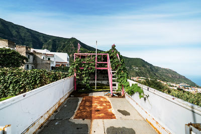 Built structure by building against sky