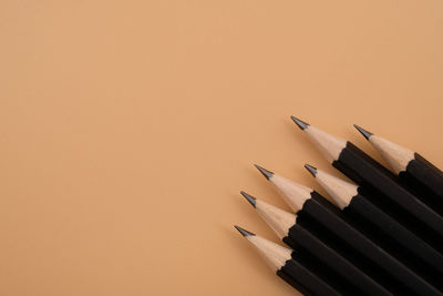 Close-up of pencils against white background