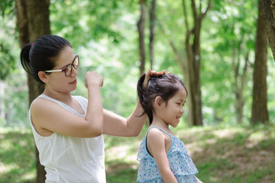 Mother and daughter in park